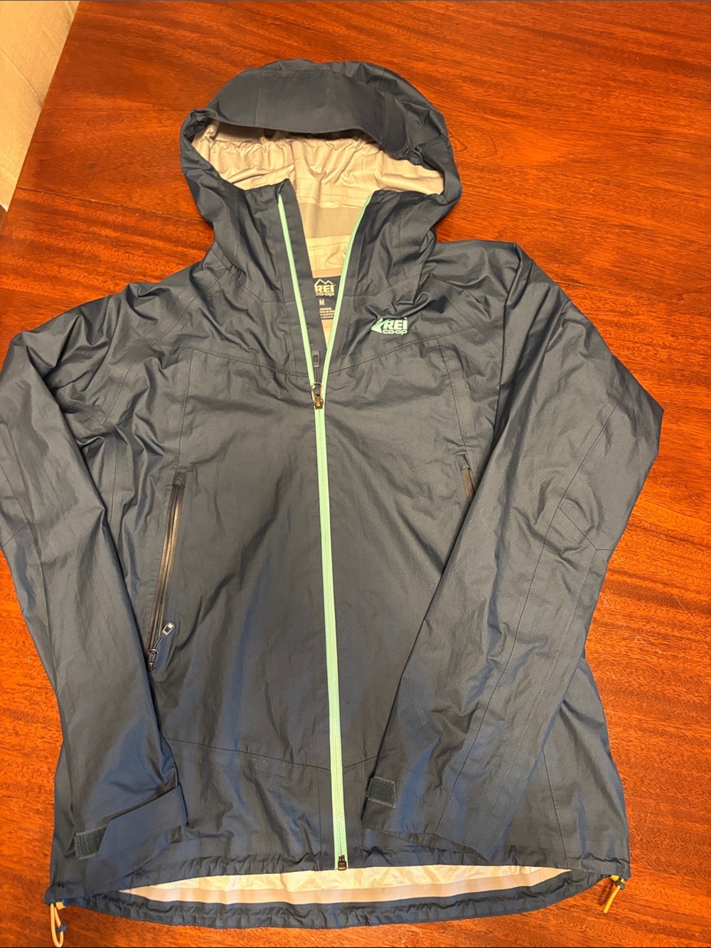 REI Women's Navy Hooded Rain Jacket with Mint Accents